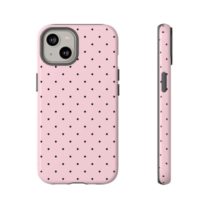 Millennial pink polka dot iPhone case with slim design, offering stylish protection for women.