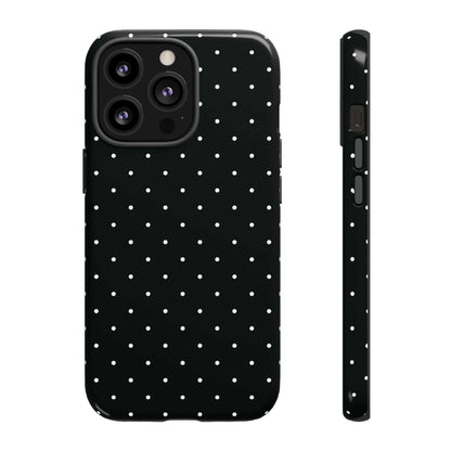Black chic polka dot iPhone case with minimalist design, featuring white spots on a black background for a stylish and protective accessory.