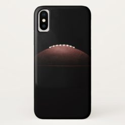 American football ball on black background iPhone x Case