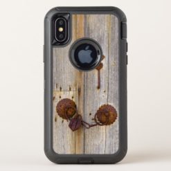 Rusty vintage old iron padlock on a wooden door. OtterBox defender iPhone x Case
